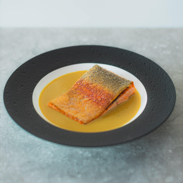 Pan seared Tasmanian ocean trout, infused-freshly squeezed coconut milk of lime leaf, galangal and turmeric